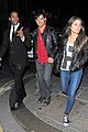taylor lautner marie avgeropoulos matching jackets london 16